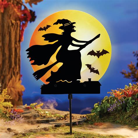 How to make your Halloween display stand out with a witch figurine and stakes